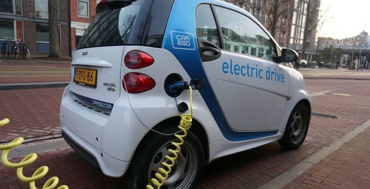 How to start or buy an electric car Automobile company in India?